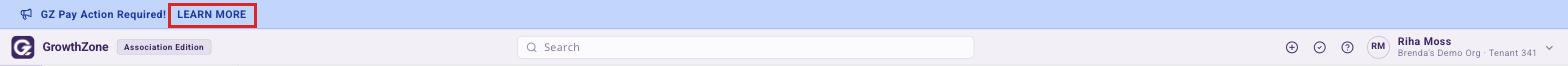 Alert icon in the menu bar at the top of the screen with the GZ Pay &mdash; Action Required message open and the Learn More link boxed