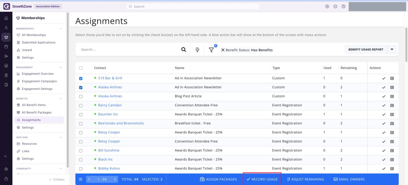 Assignments page with two rows ticked and the RECORD USAGE item in the blue action bar boxed in red